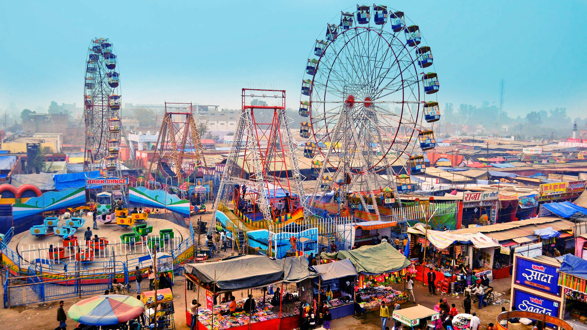 Crowds enjoying Poush Mela fairground